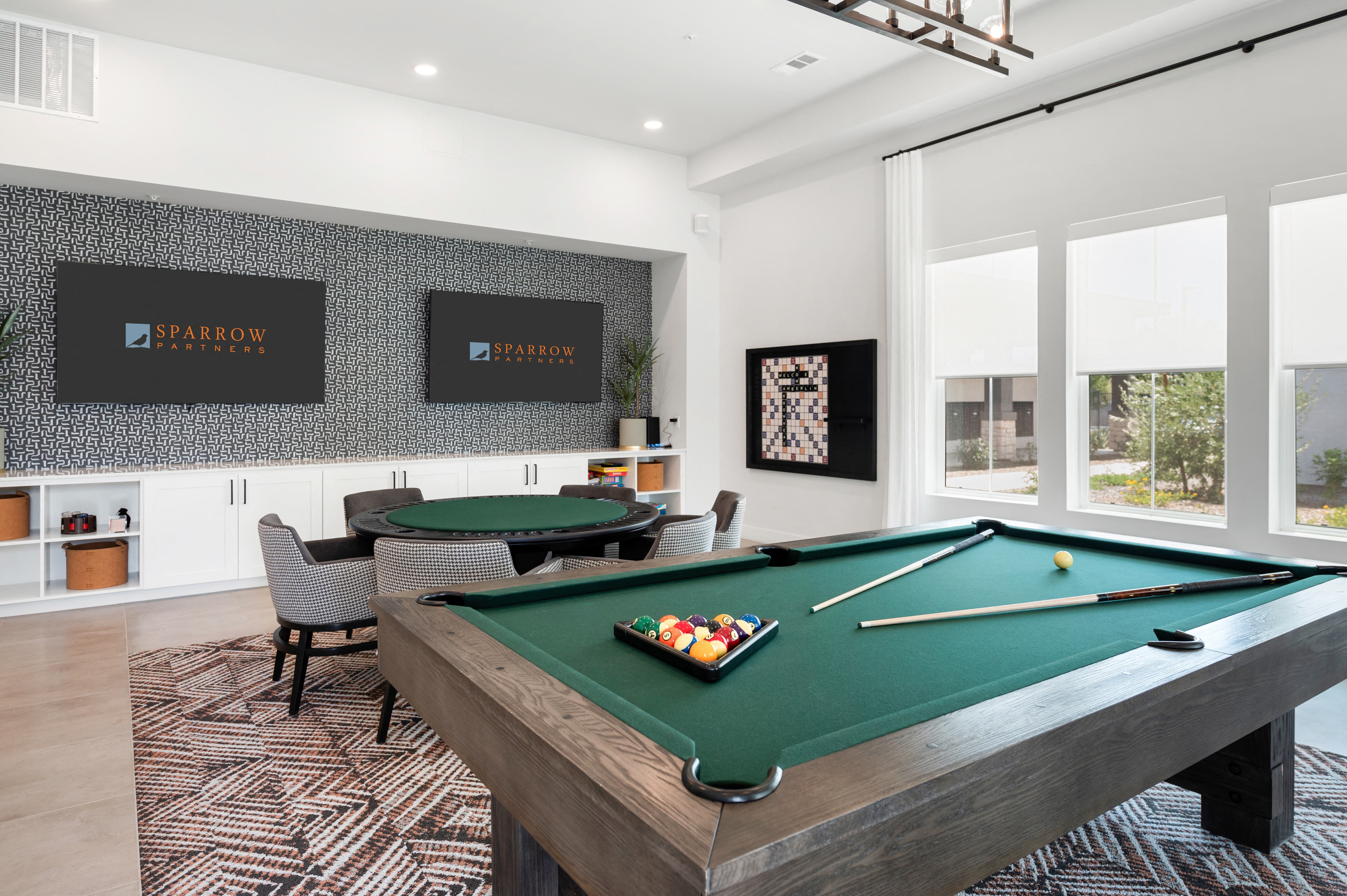 game room with pool table and poker table